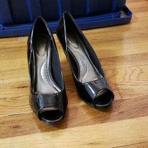 Black patent peep-toe heels